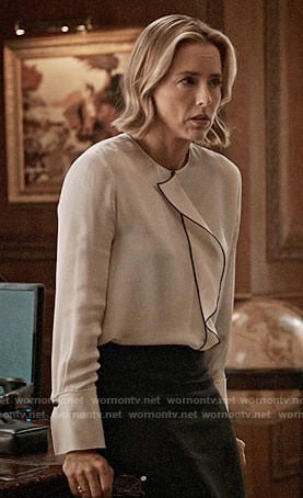 Elizabeth's white ruffled front blouse on Madam Secretary