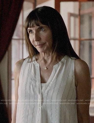 Gail's white metallic stripe top on Last Man on Earth