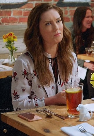 Katie's floral tie neck blouse on Great News