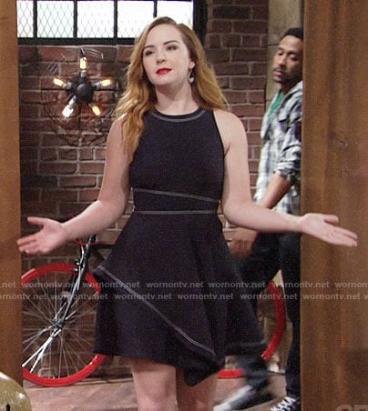 Mariah's navy dress with white stitching on The Young and the Restless