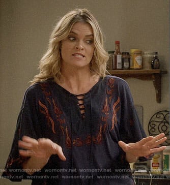 Natasha's navy embroidered lace-up top on Mom