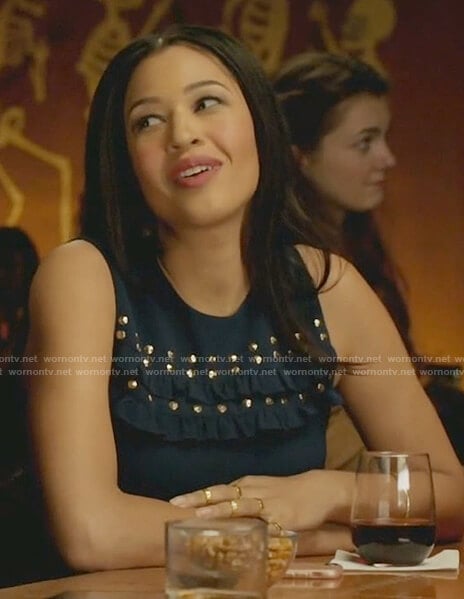 Amber's blue studded ruffle front dress on The Mayor