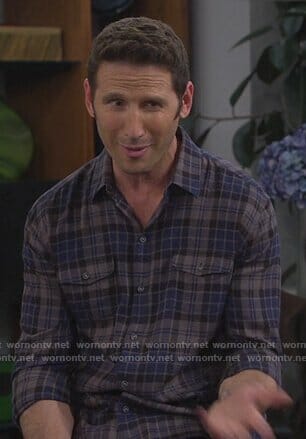 Josh's blue plaid shirt on 9JKL