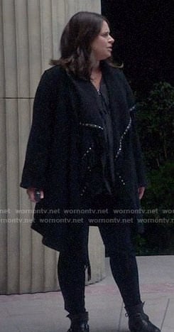 Quinn's black studded trim coat on Scandal