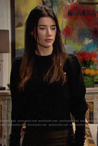 Steffy's black sweater with gold shoulder buttons on The Bold and the Beautiful