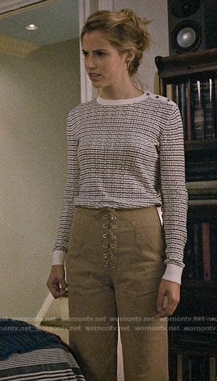 Stevie's white patterned sweater and lace-up pants on Madam Secretary