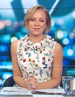 Carrie's white floral print ruffle collar dress on The Project