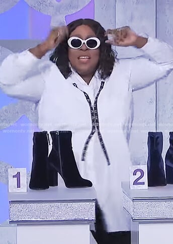 Loni's white shirtdress with front clasps on The Real
