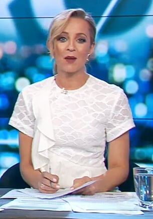 Carrie's white short sleeve ruffle dress on The Project