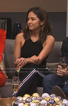 Erin's black side striped pants on E! News