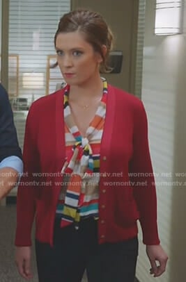 Katie's multi-color tie neck top on Great News