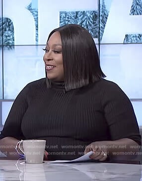 Loni's black ribbed short sleeve top on The Real