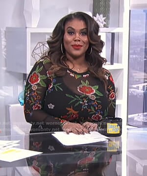 Nina Parker's black floral mesh top on E! News Daily Pop