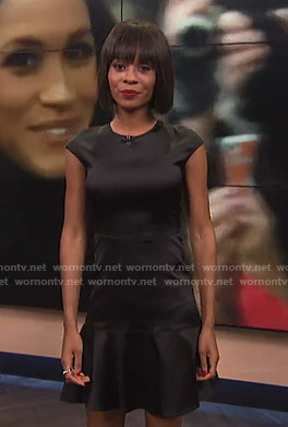 Zuri's black satin flare dress on E! News