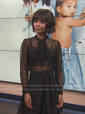 Zuri's black tie neck mesh blouse on E! News