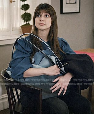 Ali's blue ruffled shoulder top on Madam Secretary