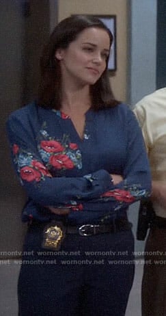 Amy's blue and pink floral blouse on Brooklyn Nine-Nine