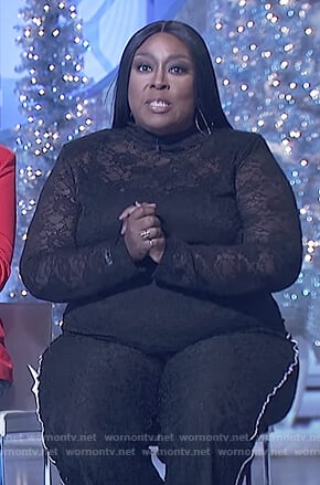 Loni's black floral lace top on The Real