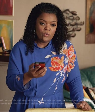 Dina's blue floral print tunic top on The Mayor