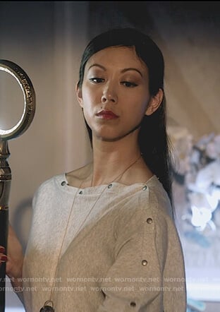 Tina's gray snap button sweater on Marvel's Runaways