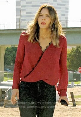 Paige's red lace-trim blouse on Scorpion