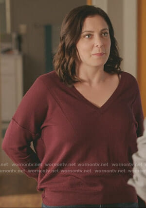 Rebecca's red v-neck sweater on Crazy Ex-Girlfriend