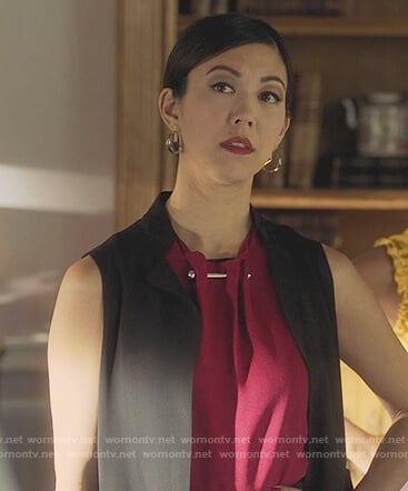 Tina's red barbell sleeveless top on Marvels Runaways