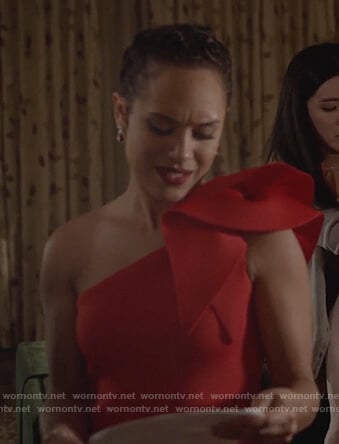 Anika's red one off shoulder dress on Empire