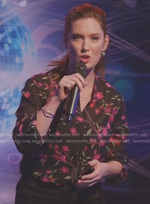 Katie's black floral blouse on Great News