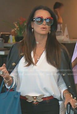 Kyle's black jacket with tiger head buttons and bee buckle belt on The Real Housewives of Beverly Hills