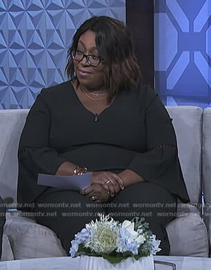 Loni's black bell sleeve jumpsuit on The Real