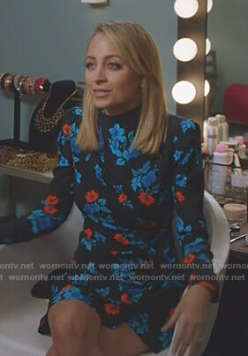 Portia's black floral wrap dress on Great News