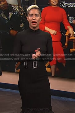 Sibley's black ruffle hem skirt and crystal buckle belt on E! News