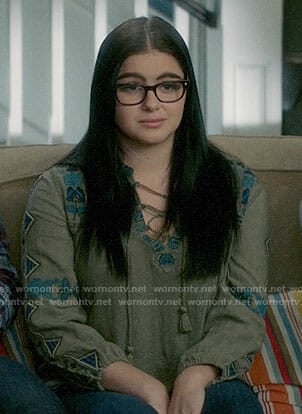 Alex's embroidered lace-up top on Modern Family