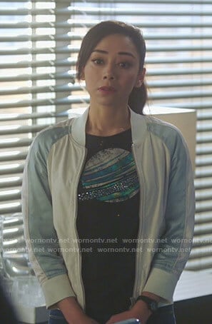 Ella's black planet print tee and bomber jacket on Lucifer