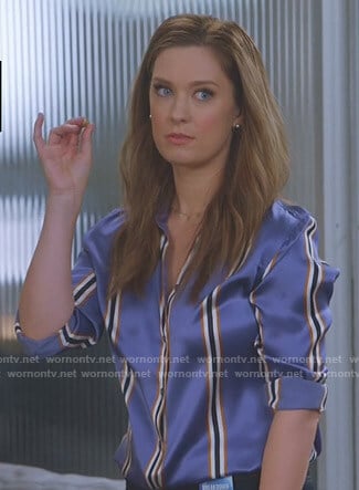 Katie's purple striped shirt on Great News