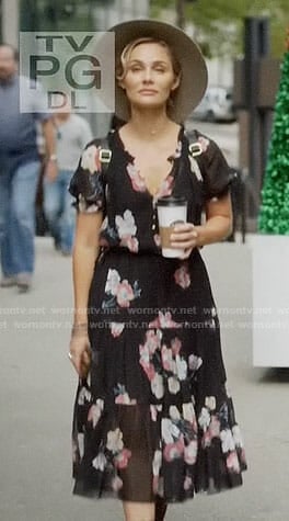 Scarlett's black floral midi dress and hat on Nashville