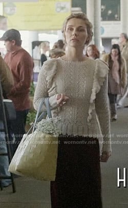 Scarlett's beige ruffled sweater on Nashville