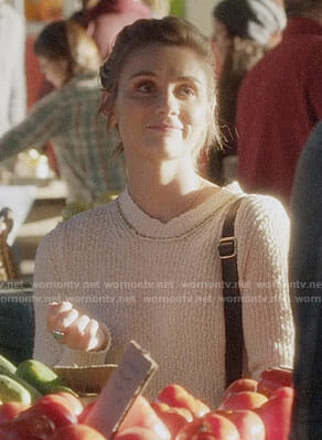 Scarlett's white sweater with gold stitching on Nashville