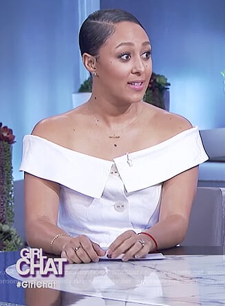 Tamera's white off shoulder jumpsuit on The Real