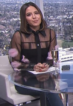 Erin's black mesh blouse with tulle flowers on E! News Daily Pop