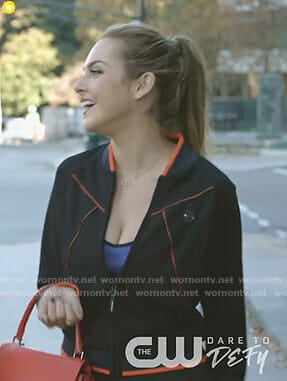 Fallon's black jacket with orange trim on Dynasty