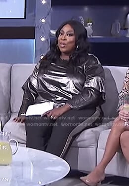 Loni's metallic ruffled sleeve top and side striped pants on The Real