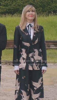 Moira's black bird print jacket and trousers on Schitt's Creek