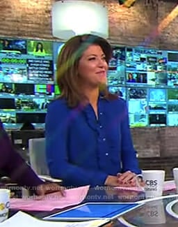 Norah's blue ruffle front dress on CBS This Morning