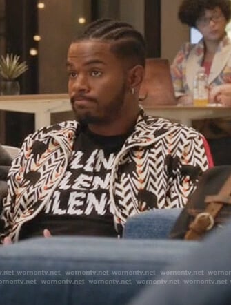 Aaron's elephant print sweater and black t-shirt on Grown-ish