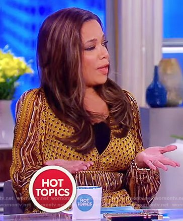 Sunny's gold print v-neck dress on The View