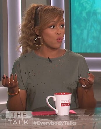 Eve's green distressed tee and palm tree skirt on The Talk