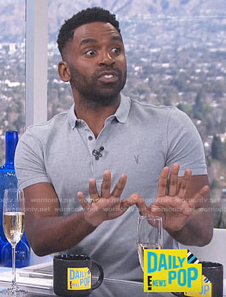 Justin's grey polo shirt on E! News Daily Pop