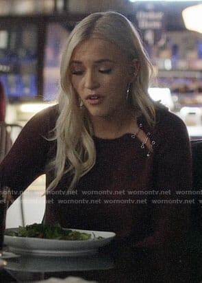 Maddie's sweater with safety pin shoulders on Nashville